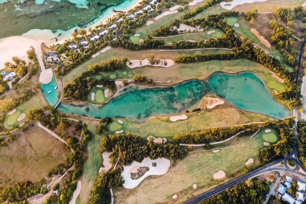 View from the height of the island of Mauritius in the Indian Ocean and the golf course on the Le