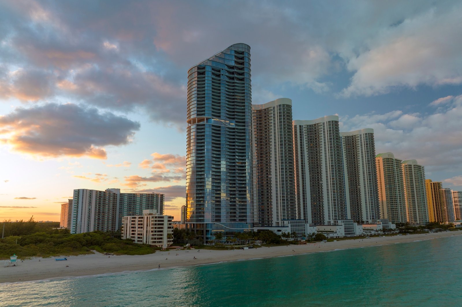 Evening landscape of sandy beachfront in Sunny Isles Beach city