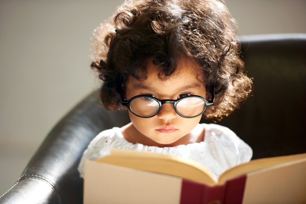 Learning as she grows. Shot of a cute little girl at home.